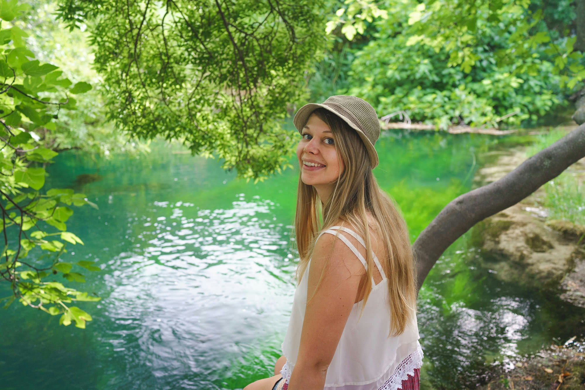 Ina looking pretty on a branch by the water
