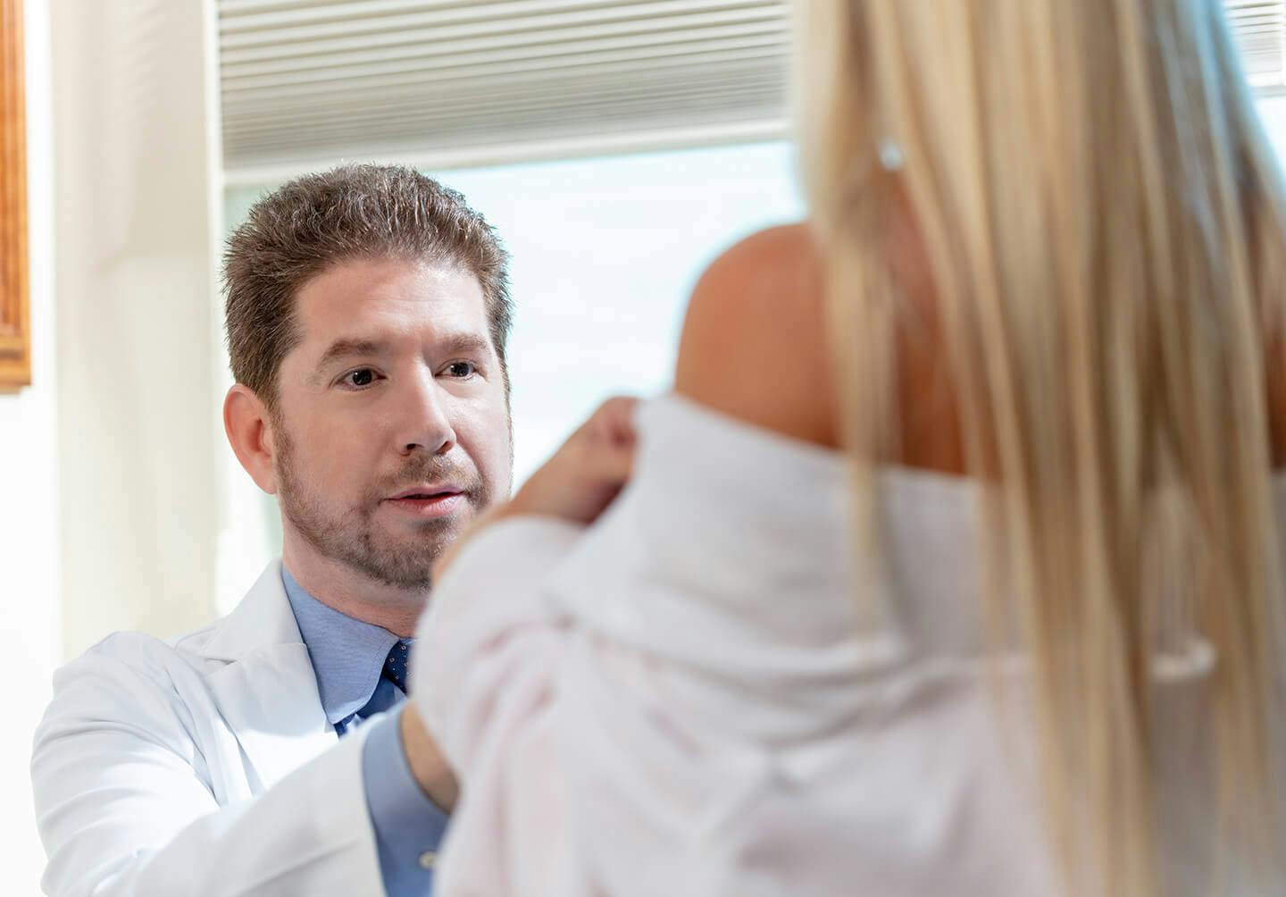 doctor looking at a woman