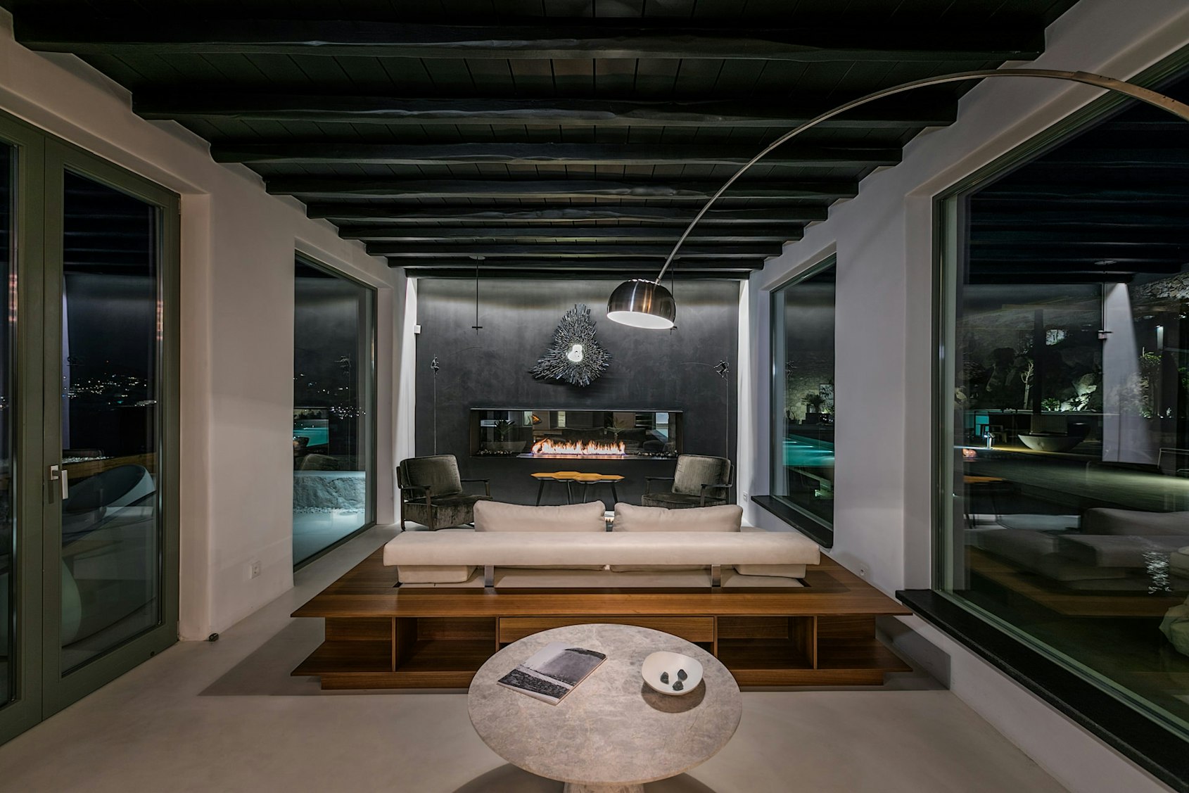 living room indoors room flooring furniture interior design lobby lighting floor couch
