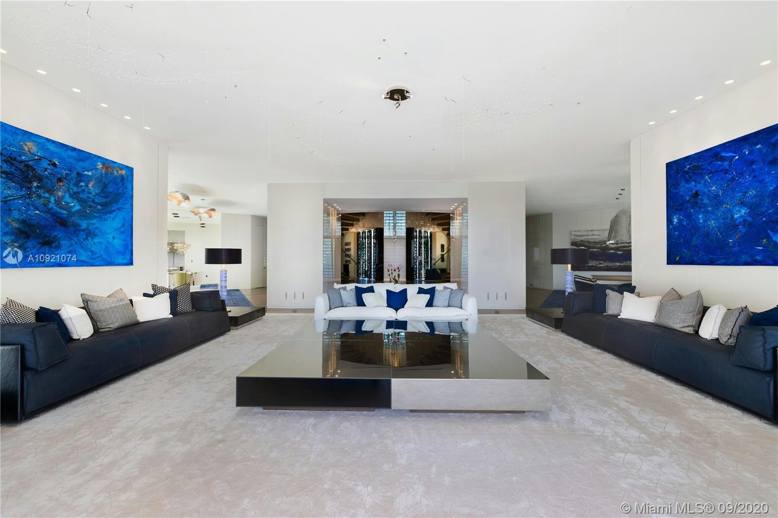 furniture living room room indoors flooring table interior design couch floor lobby