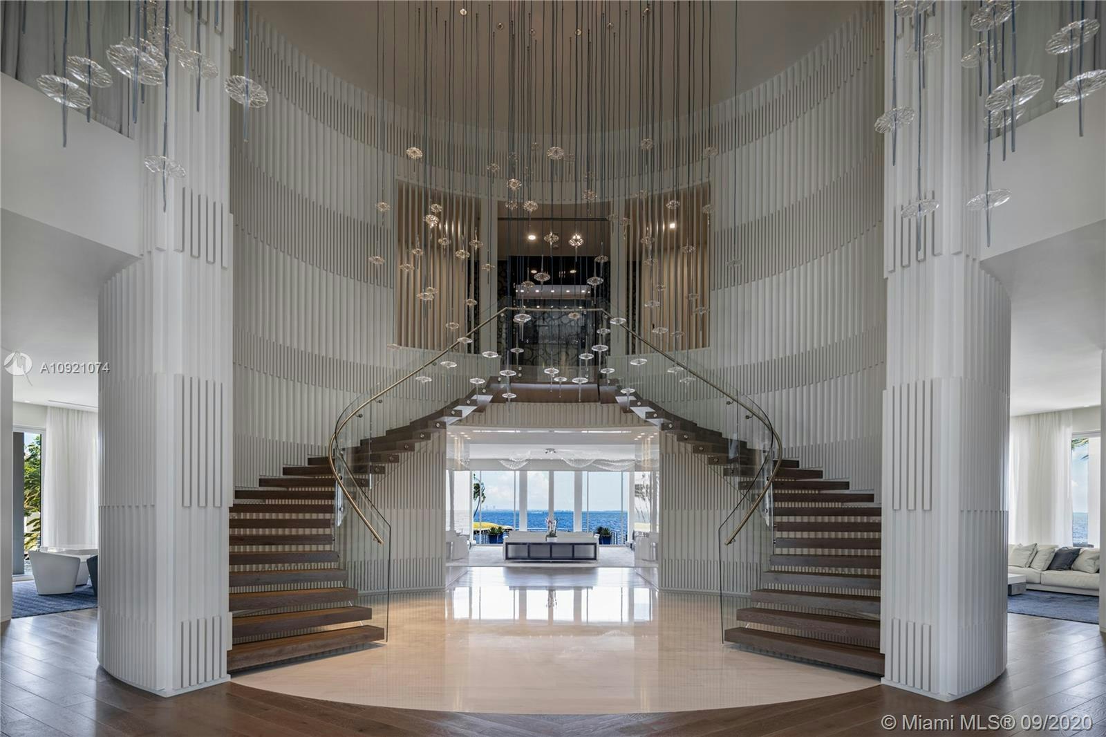handrail banister flooring floor lobby room indoors interior design staircase lighting