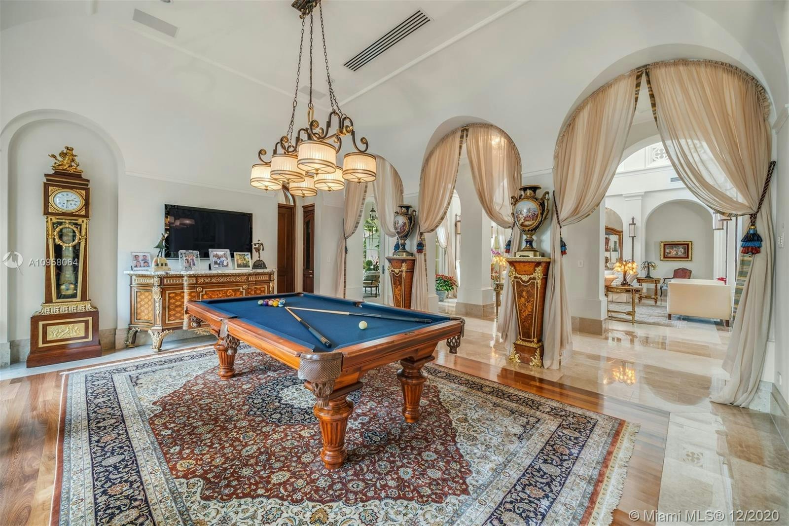 furniture room indoors table billiard room flooring rug