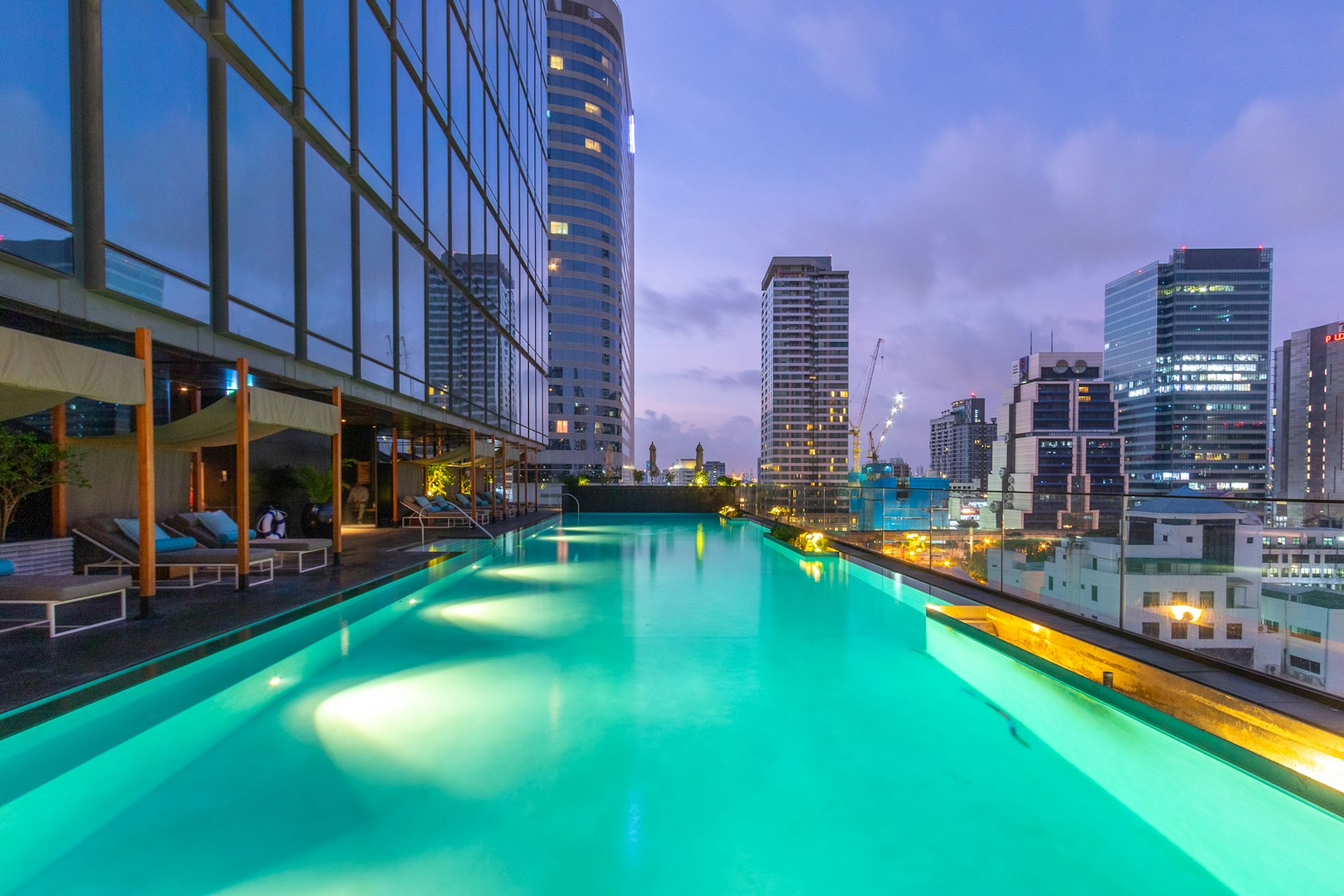 building water pool hotel city urban metropolis resort high rise swimming pool