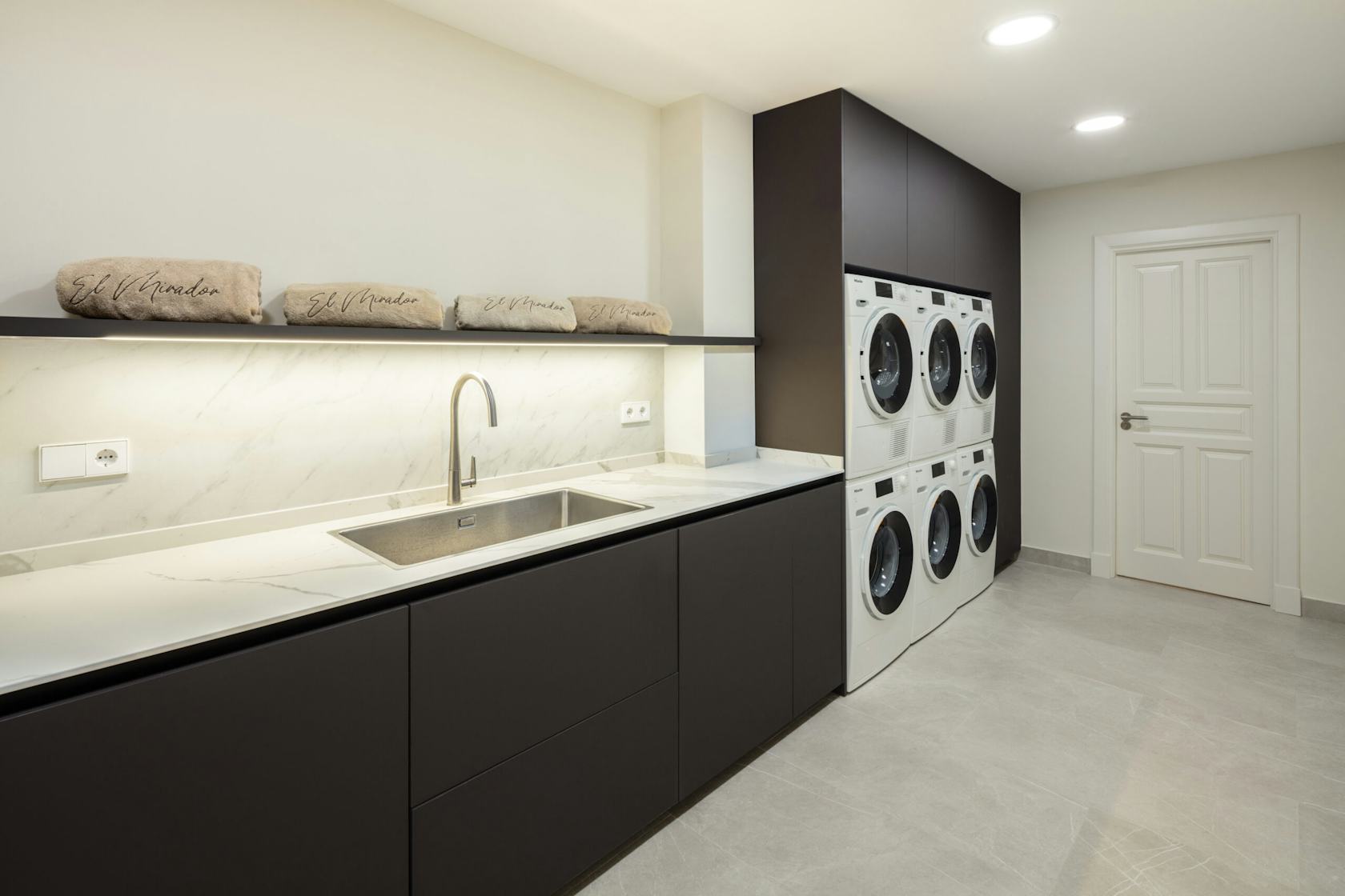 sink laundry interior design indoors washer electrical device device appliance sink faucet
