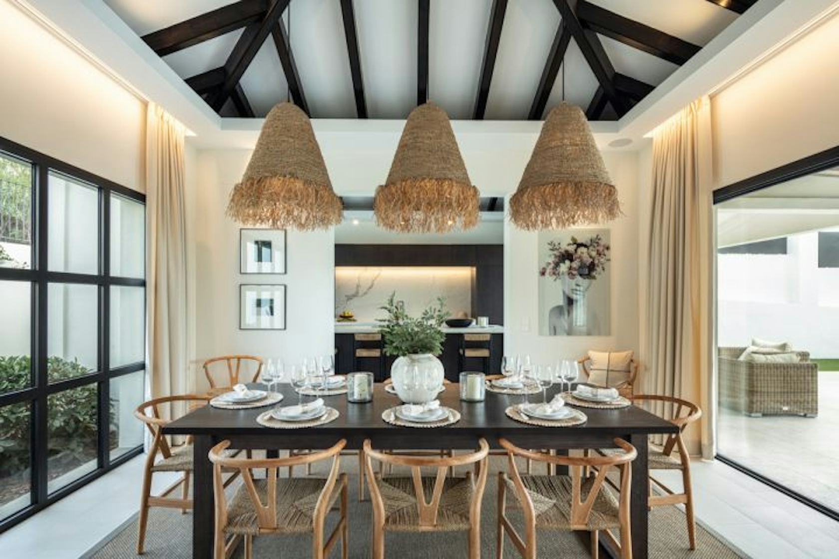 dining room dining table table furniture indoors chandelier lamp chair home decor interior design