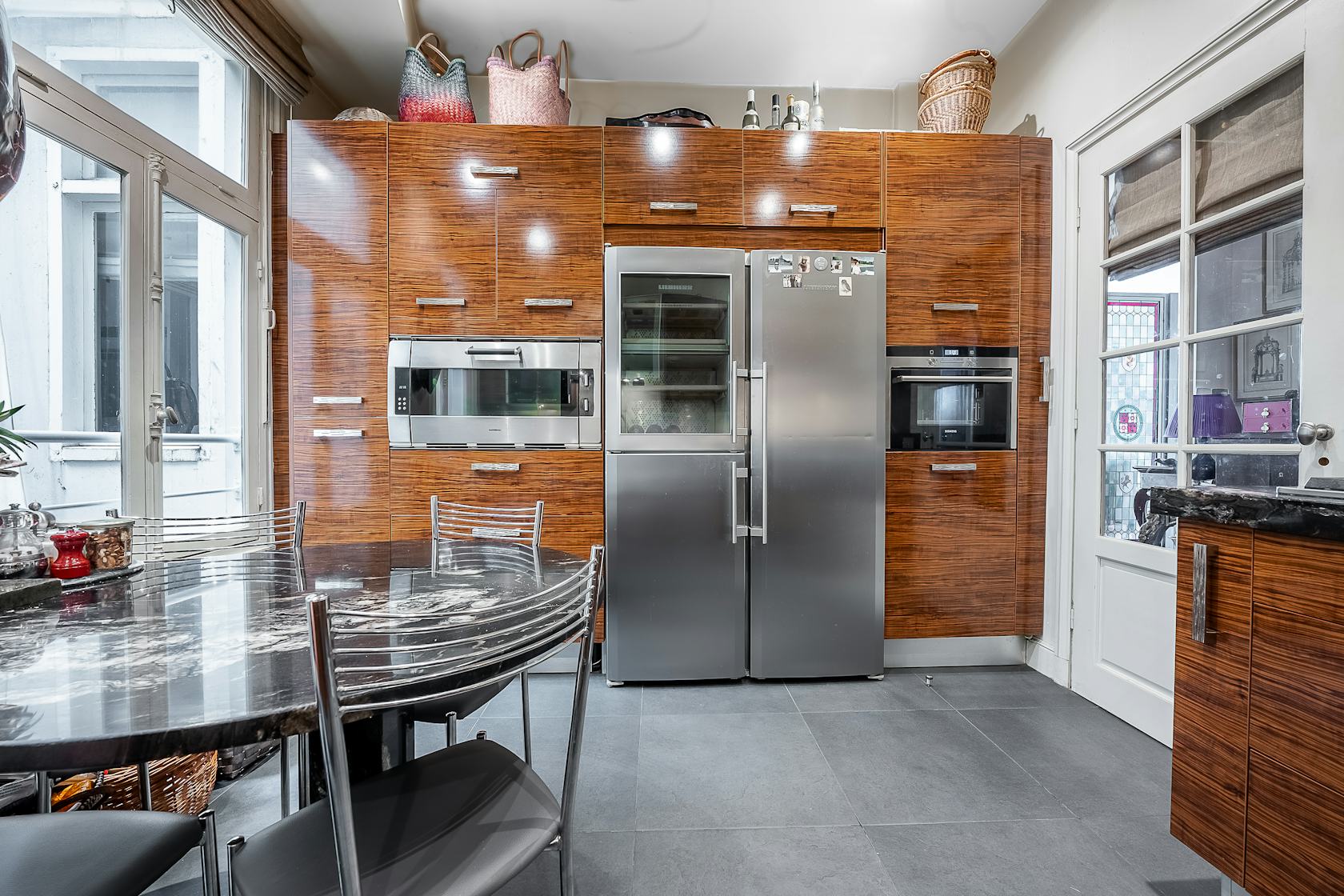 indoors interior design wood kitchen floor hardwood microwave oven flooring refrigerator