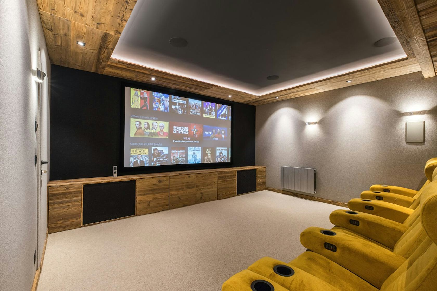 indoors interior design electronics home theater screen people person computer hardware hardware monitor