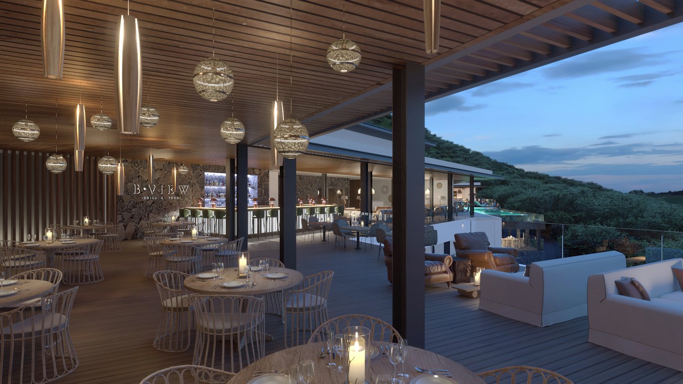 Restaurant bistronomique du resort Legend Hill ouvert sur la montagne et l'océan