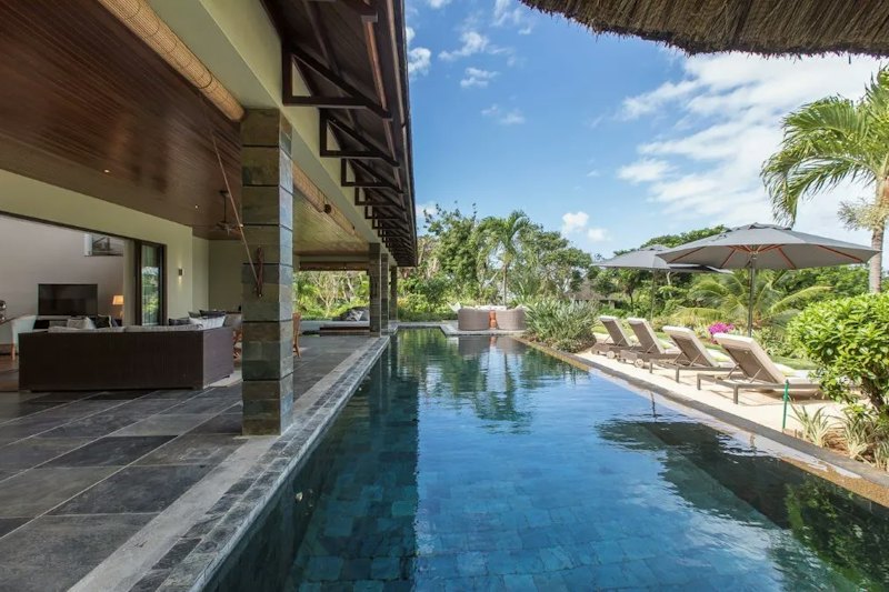 Lap pool and covered terrace of the Four Seasons villa, Anahita