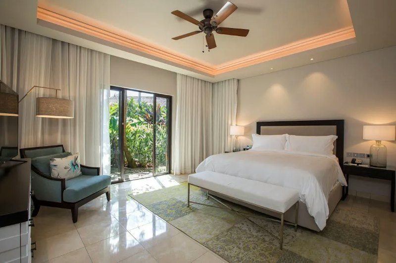 Master suite with garden access, Four Seasons villa Anahita
