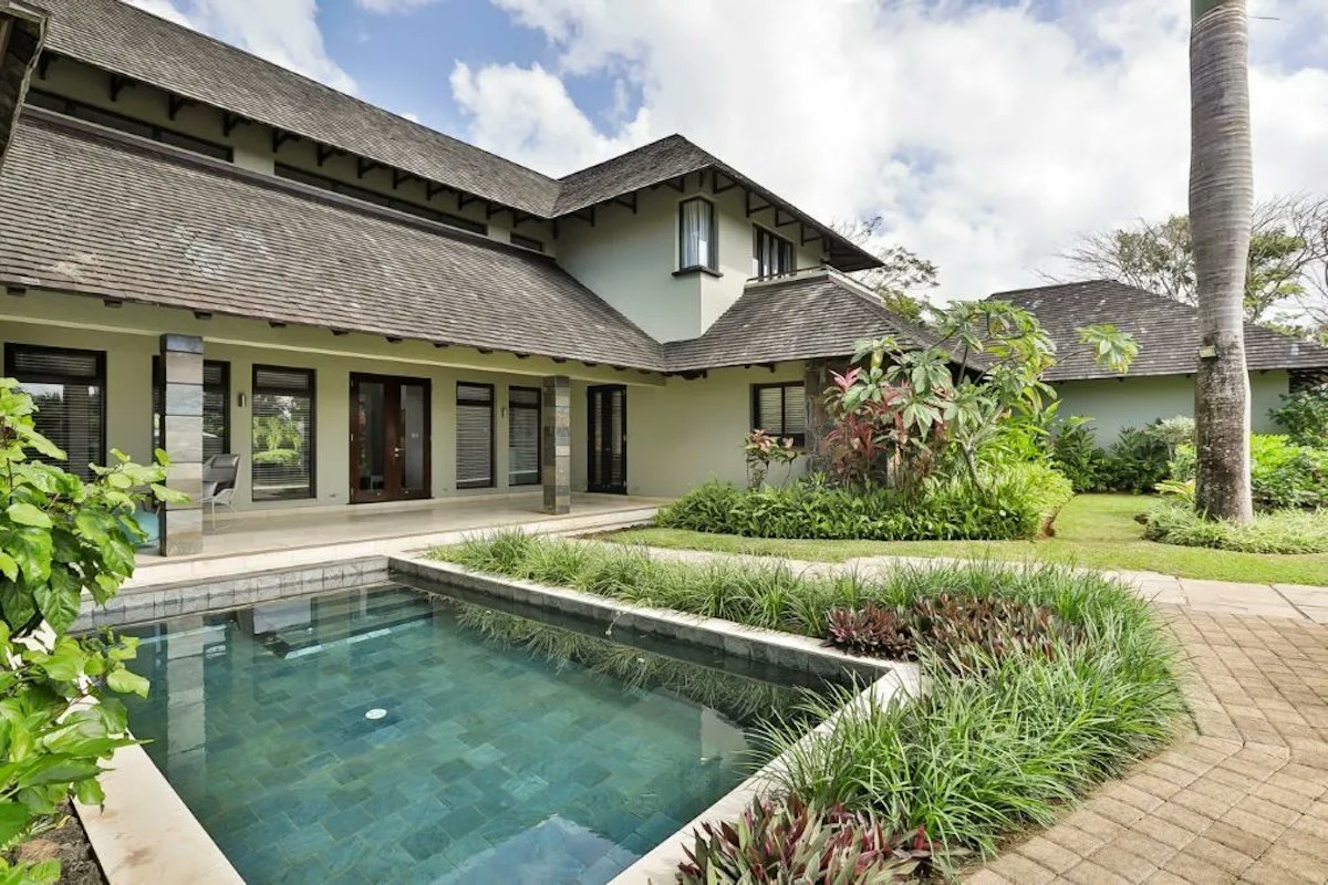 Four Seasons villa at Anahita — pool and thatched façade, GADAIT mandate GI0197