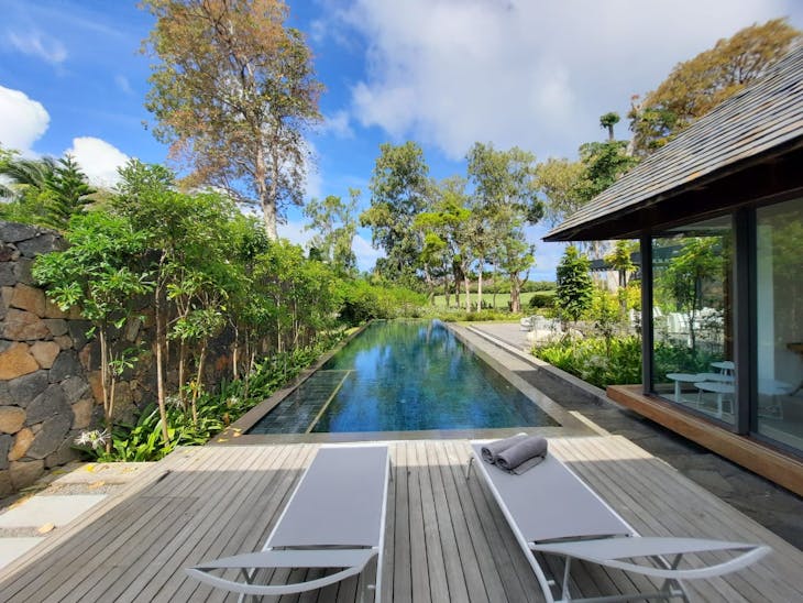pool water swimming pool outdoors nature scenery housing villa chair furniture