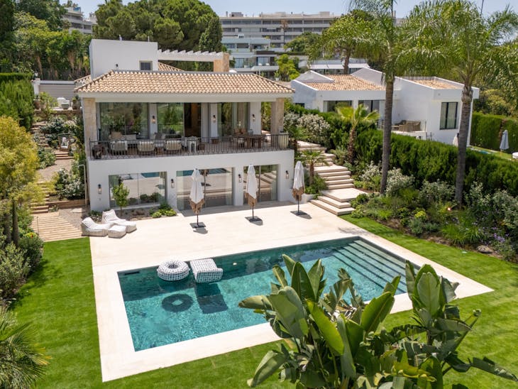 house housing villa pool water swimming pool outdoors shoe backyard plant