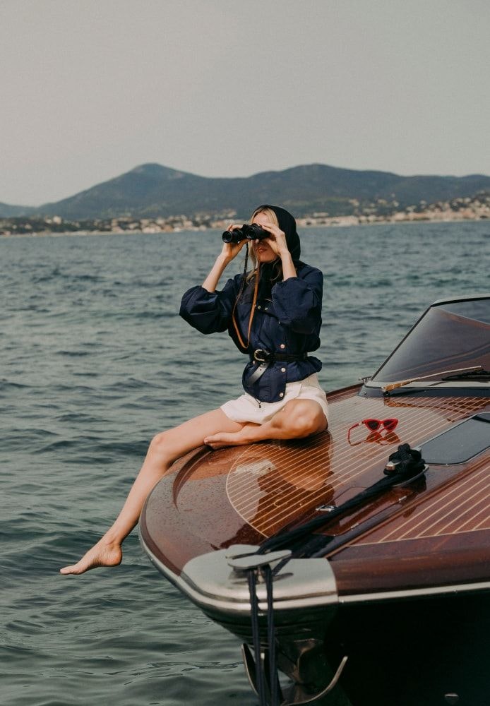 yacht camera adult female person woman boat photography sitting beachwear