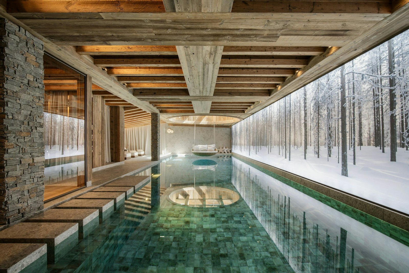Indoor pool facing the snowy forest — Moon 1850 chalet, Courchevel