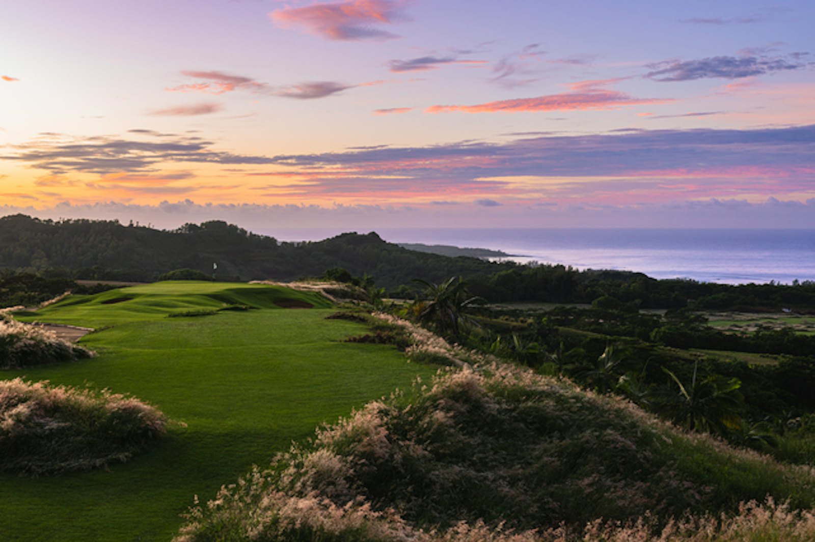 View over the golf course and mountains of the Bel Ombre estate, southern Mauritius