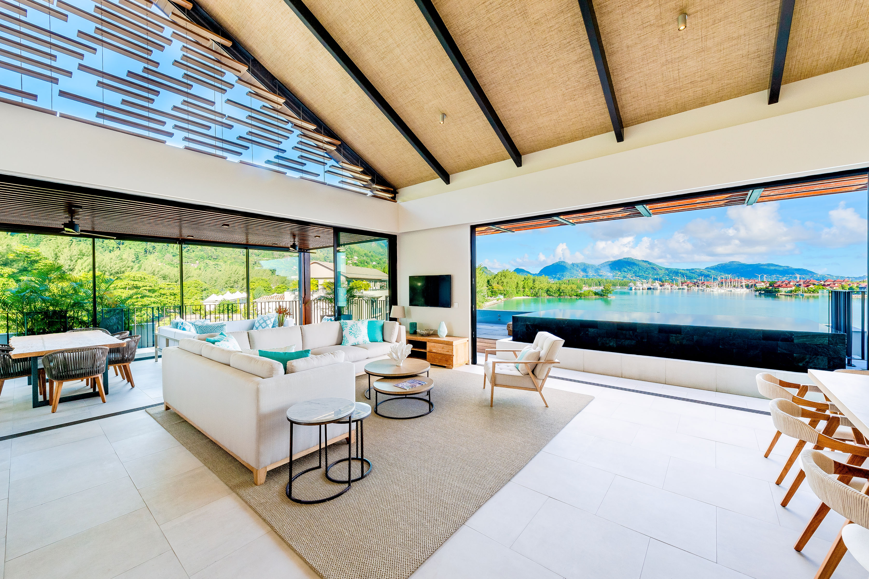 Living room opening onto the sea at Pangia Beach