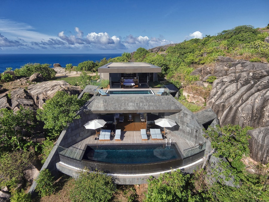 Seascape — a three-bedroom residence set into the granite, seen from above.