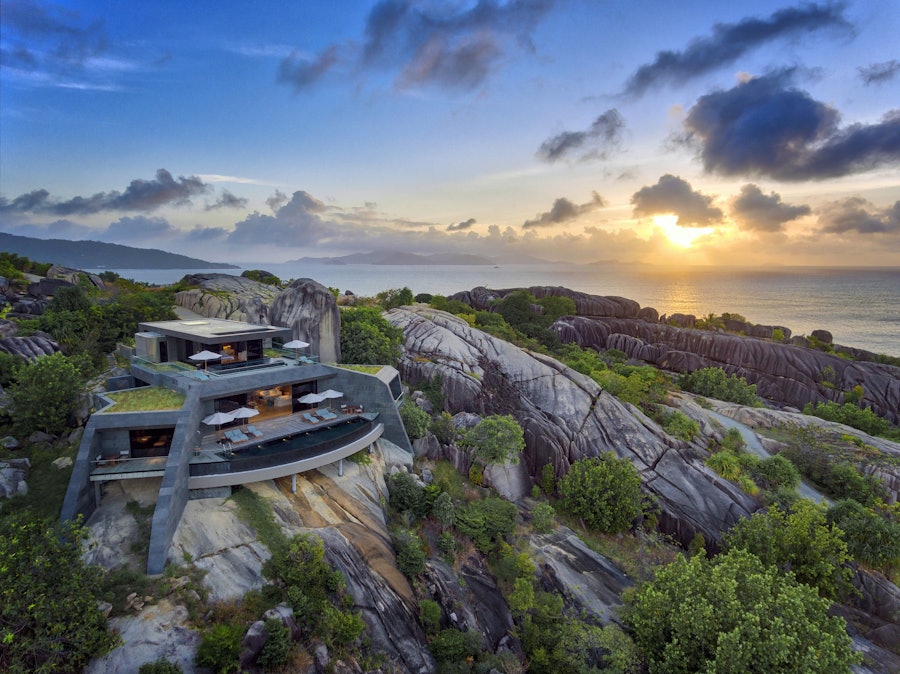 The Sanctuary — a four-bedroom residence framed by jungle and boulders.
