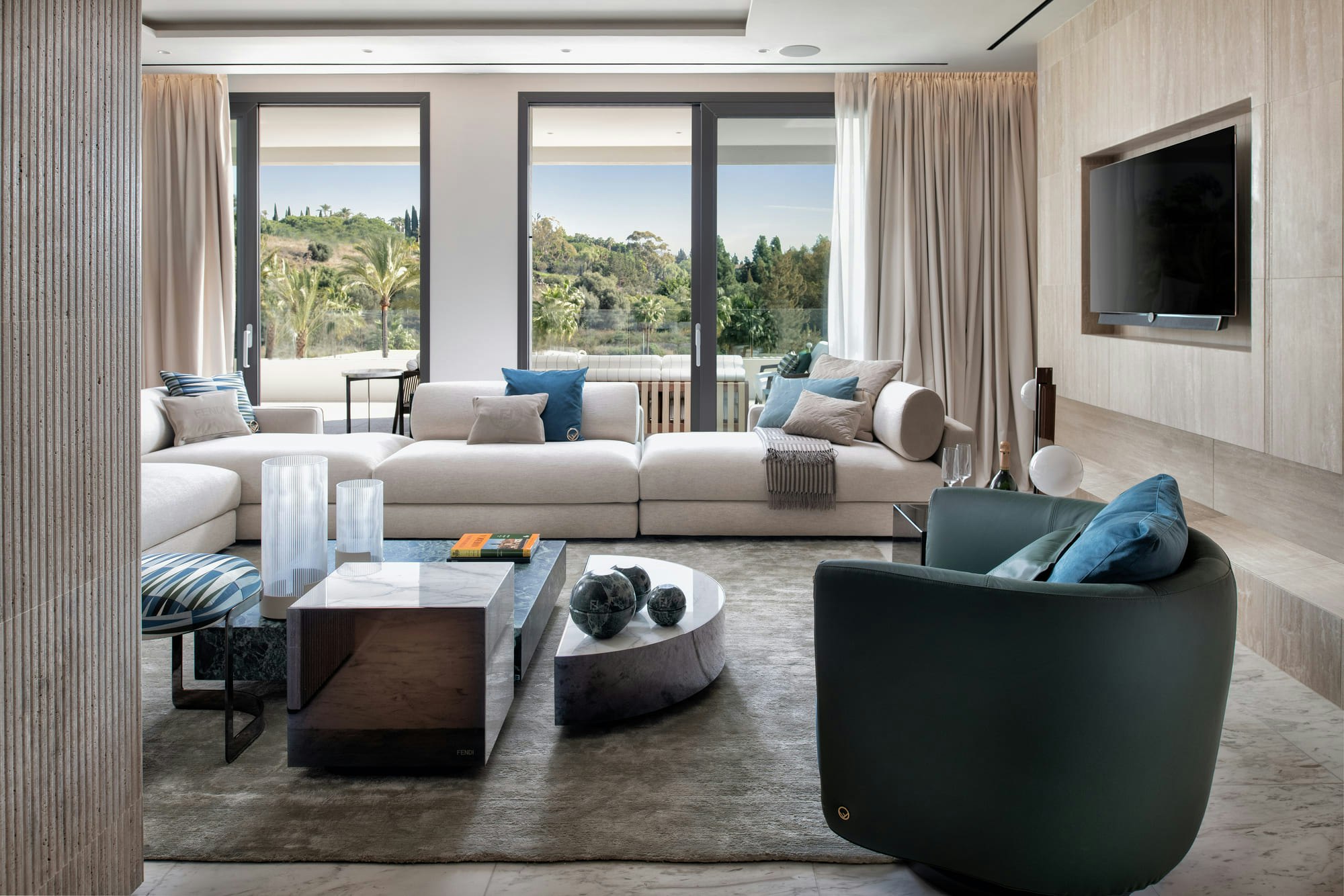 EPIC Marbella residence living room opening onto the gardens