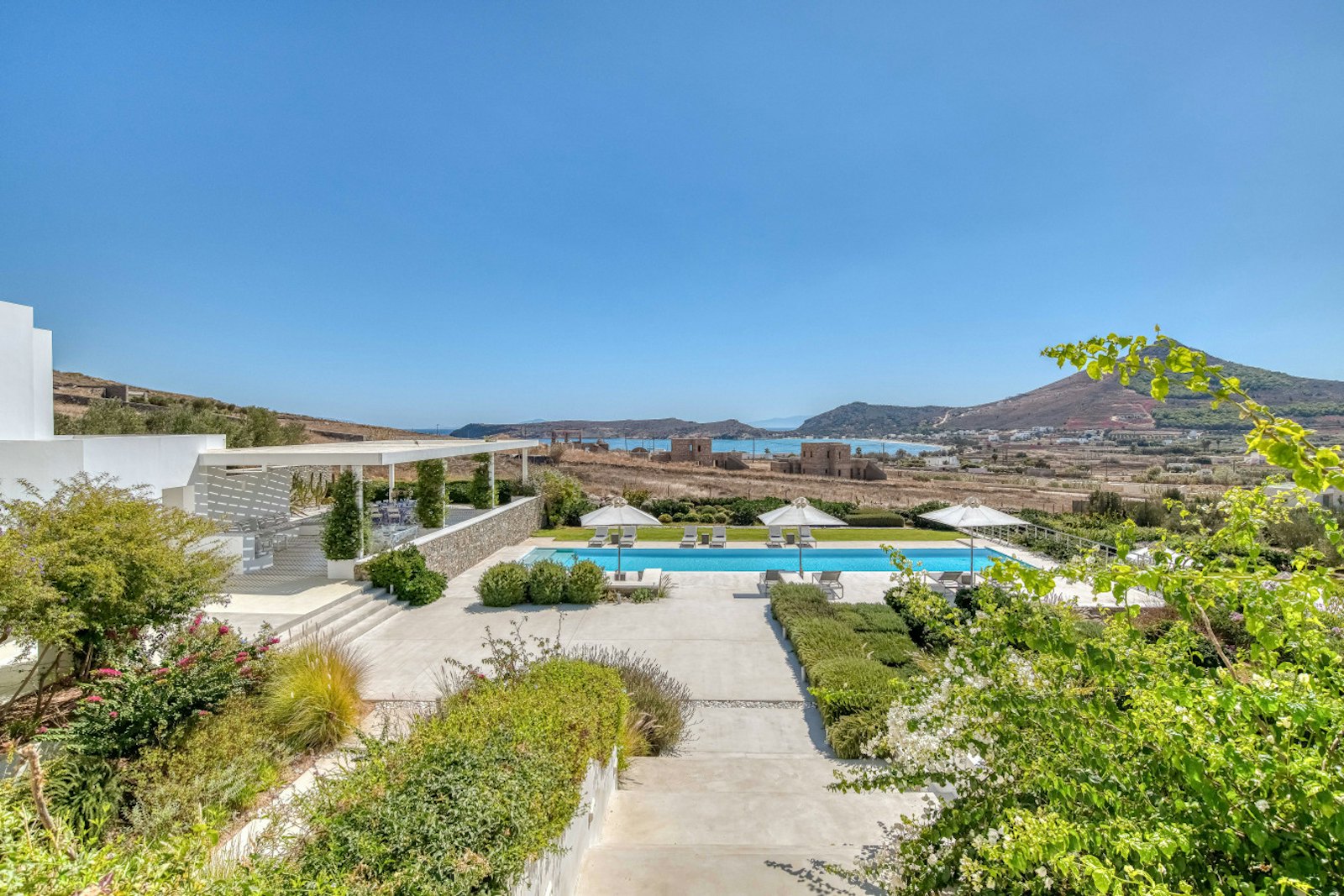 Walkway and pool facing the bay — Paros estate