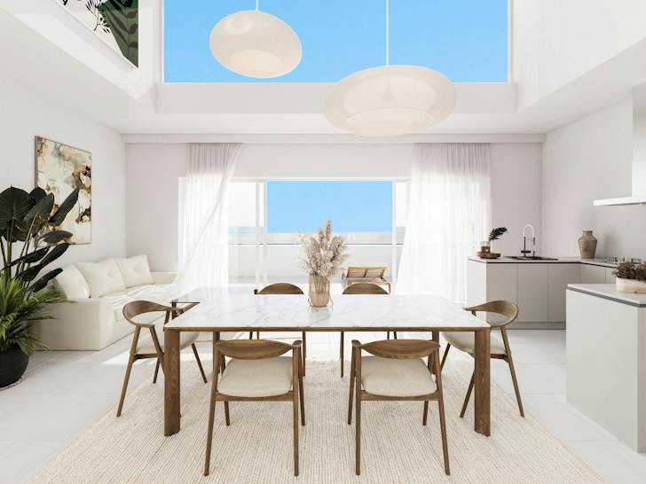 Living room and open kitchen of a THE PAC Residencies penthouse (developer rendering)