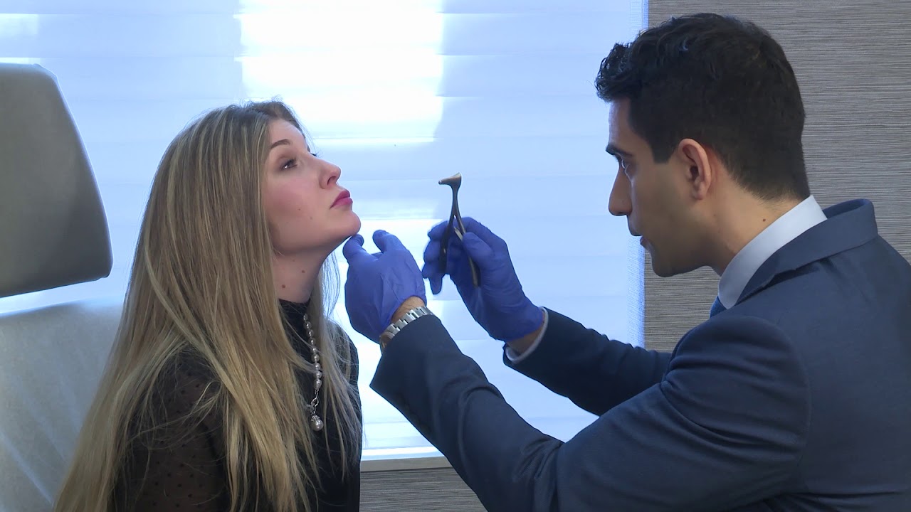 Dr. Layliev working with a patient