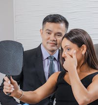 Dr. Low in a consultation with a patient.