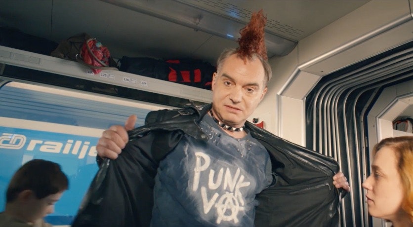Cover Image for ČESKÉ DRÁHY – VLAKEM NA VÝLET. apparel,clothing,person,human,coat,raincoat