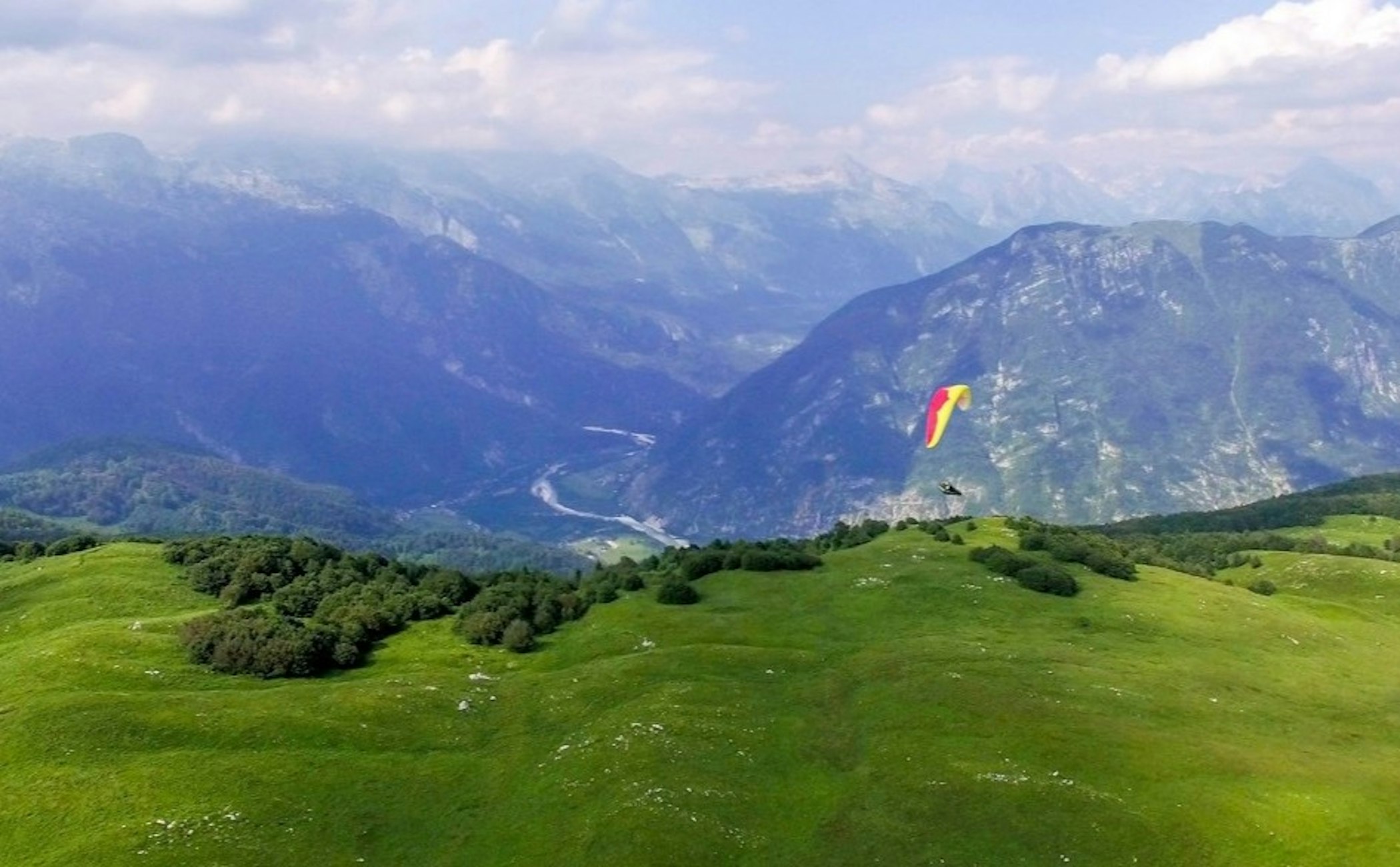 adventure,mountain,nature,outdoors,mountain range,peak,slope,scenery,gliding,landscape