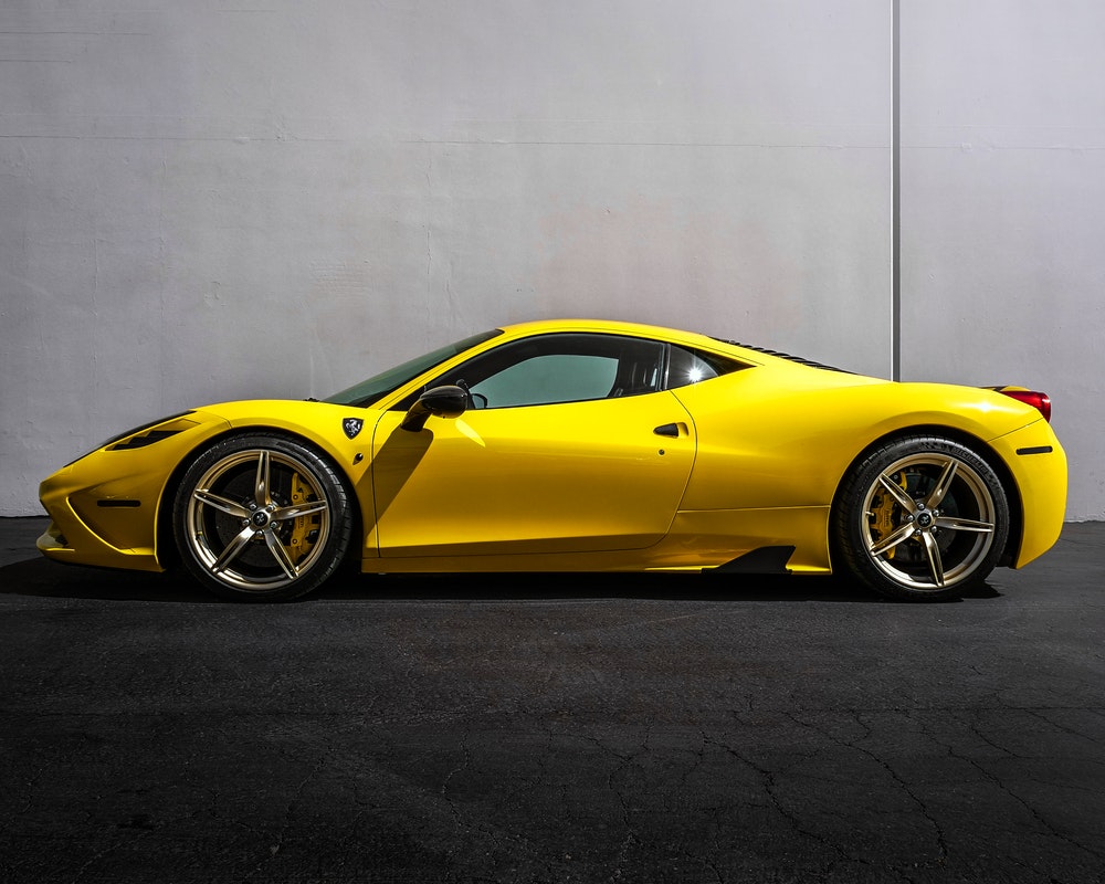 yellow Ferrari car