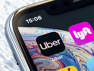 uber & lyft apps on a phone