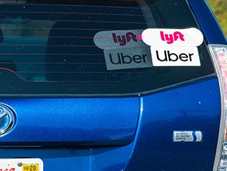 uber & lyft stickers on a car