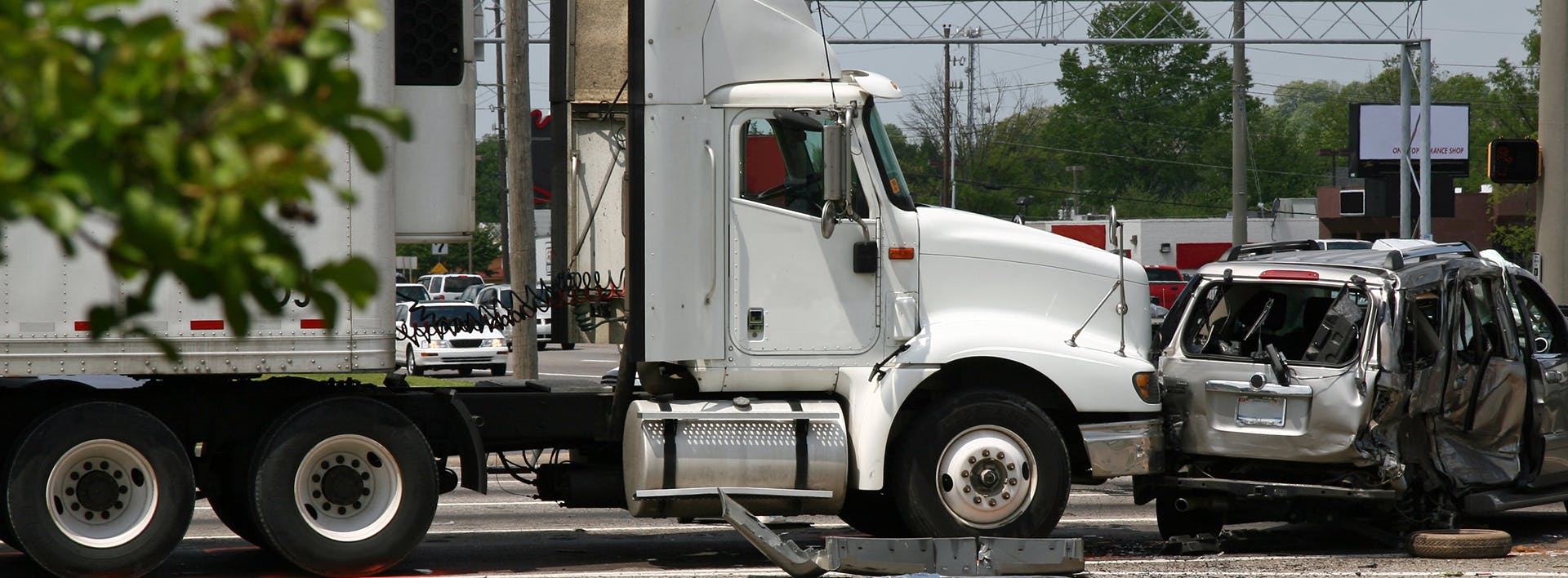 Semi-truck involved in a crash awith a mini-van.