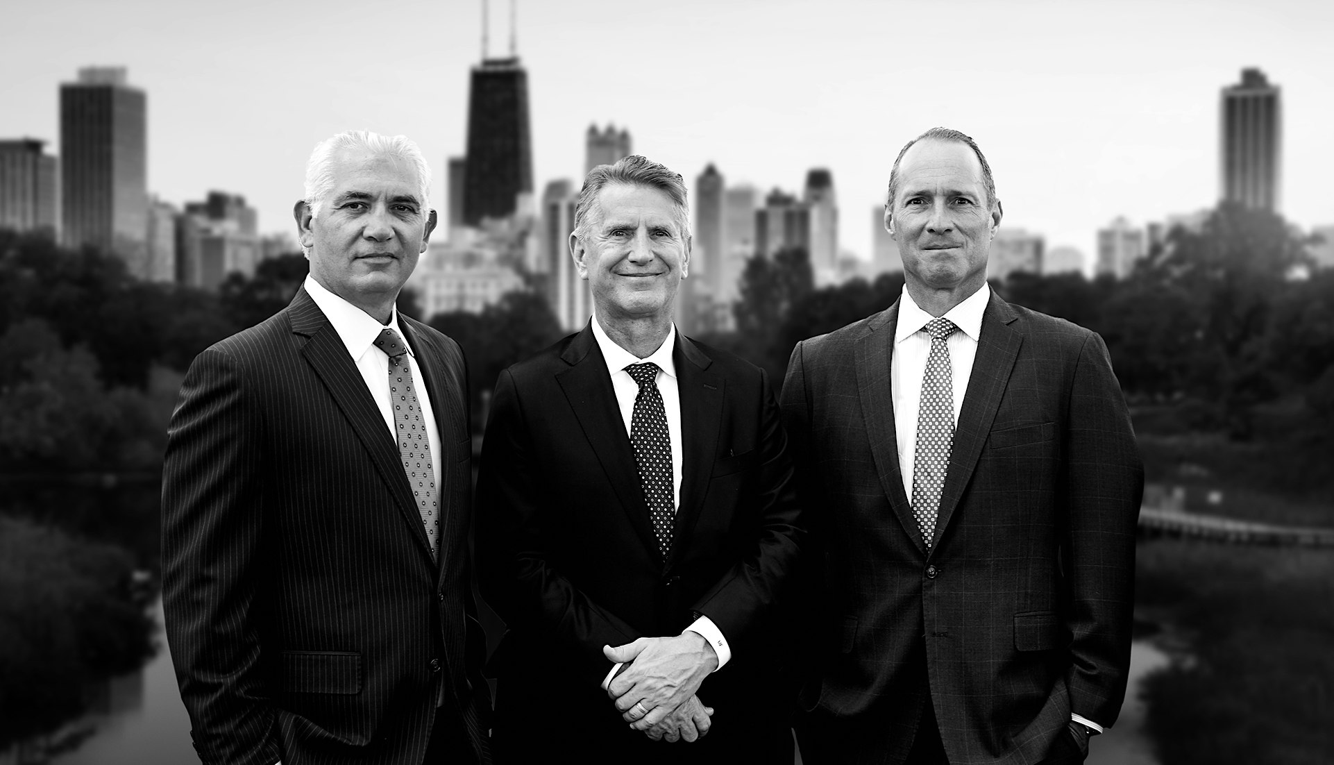 Chicago Trial Lawyers with Chicago skyline in background.