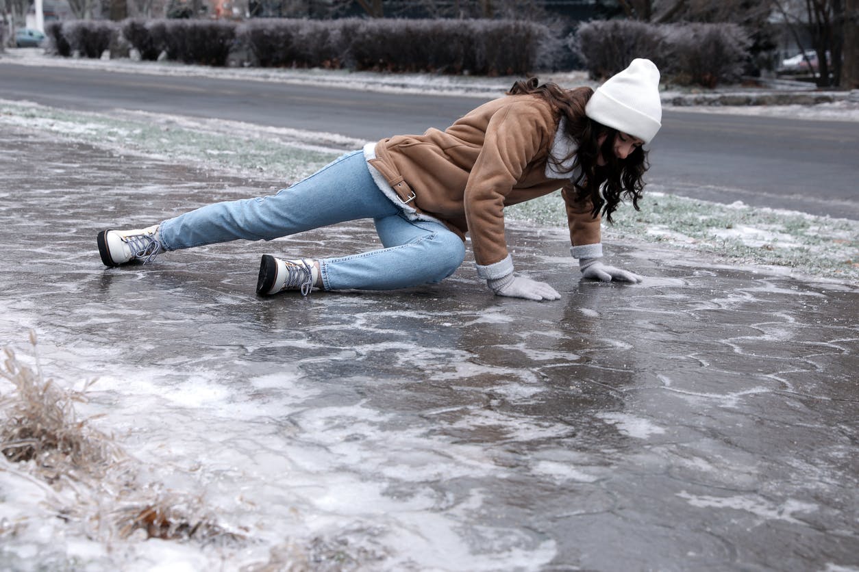 Woman who has fallen on the ice