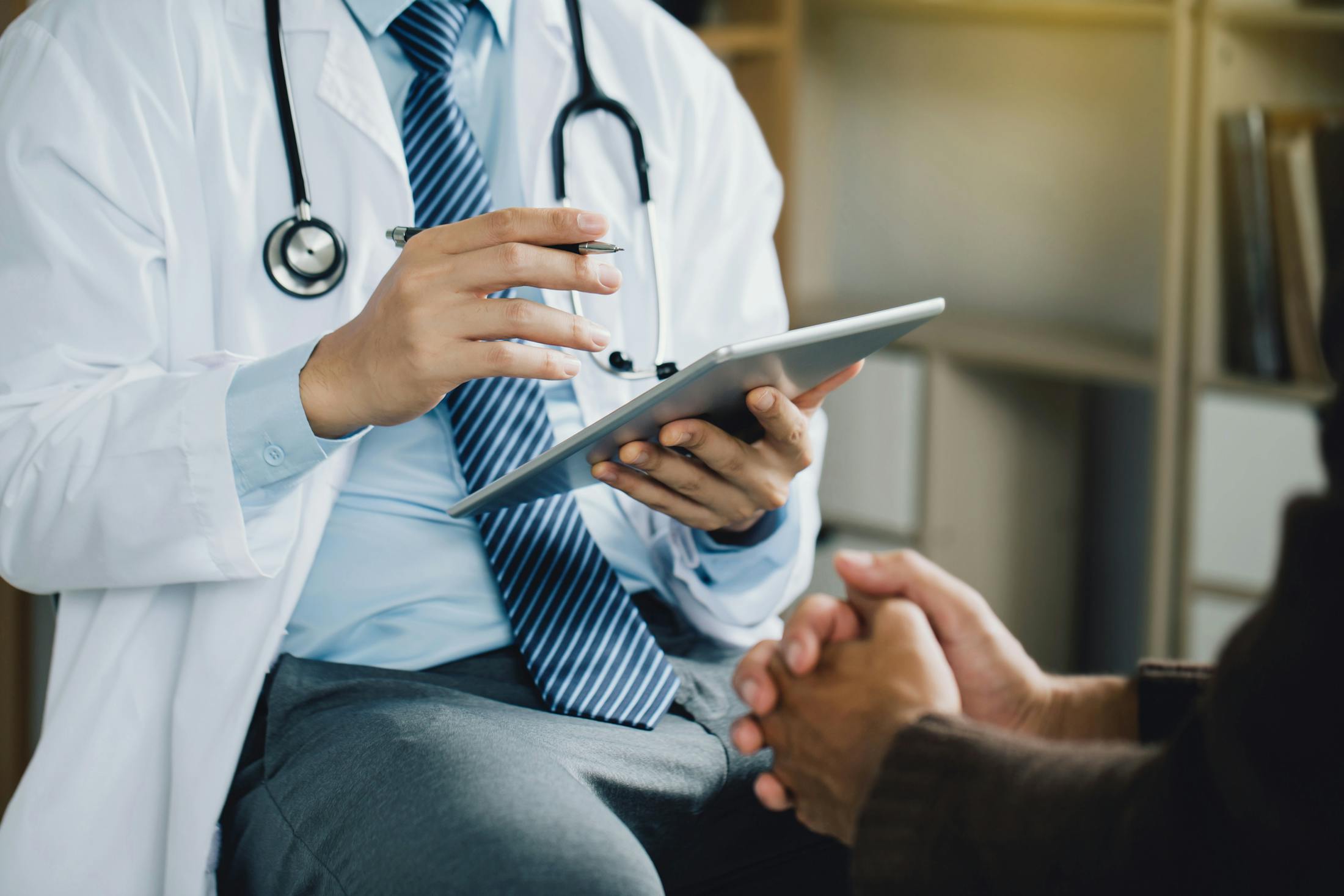 Doctor speaking to patient