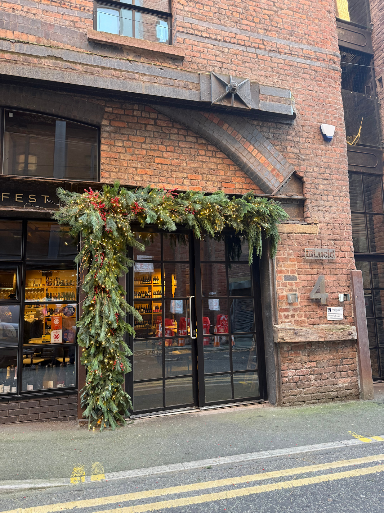 Custom commercial Christmas styling and festive arrangements installed at Manifest in the Liverpool Baltic Triangle to create a welcoming seasonal atmosphere.
