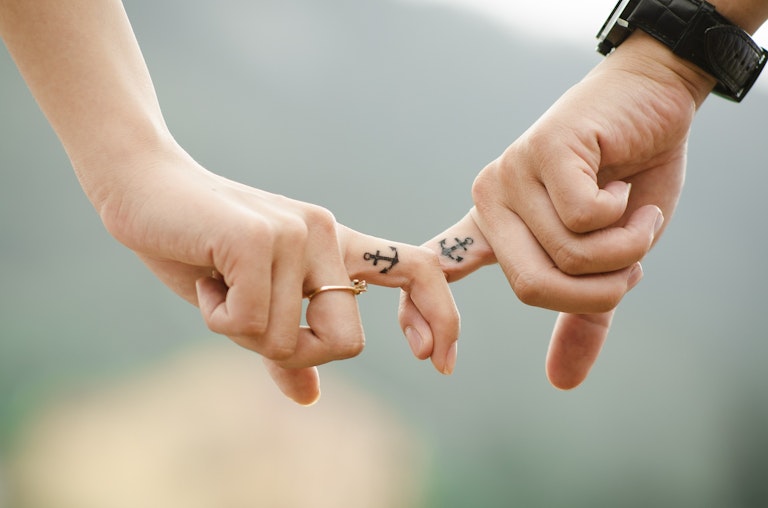 NYC Couple holding hands 