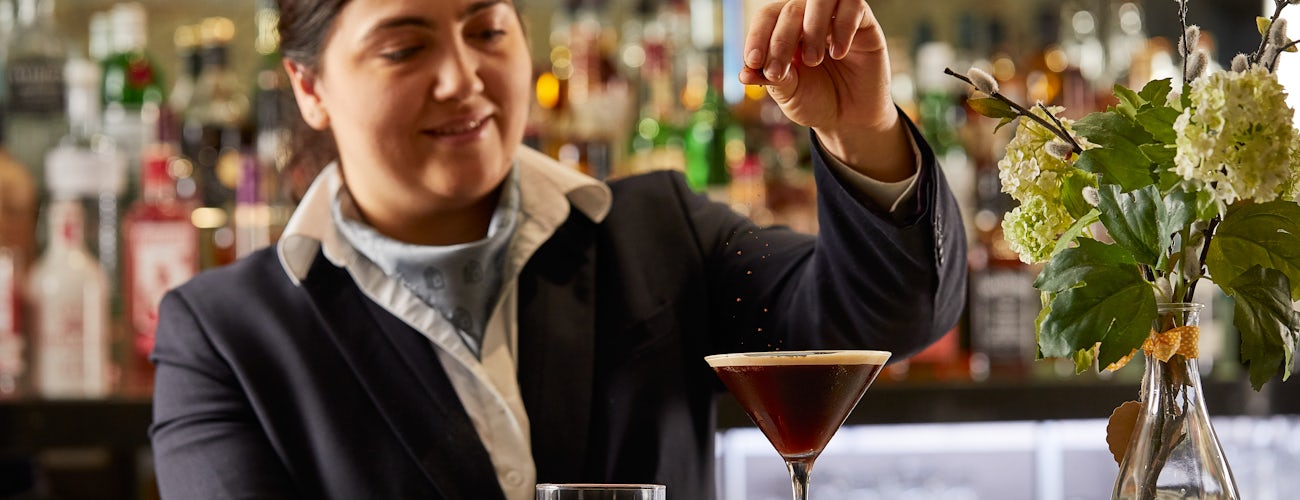 Bartender making cocktails