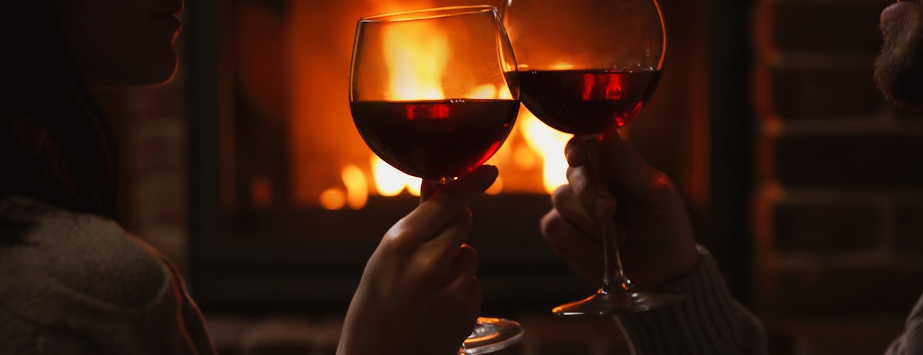 Romantic drinks by the fire