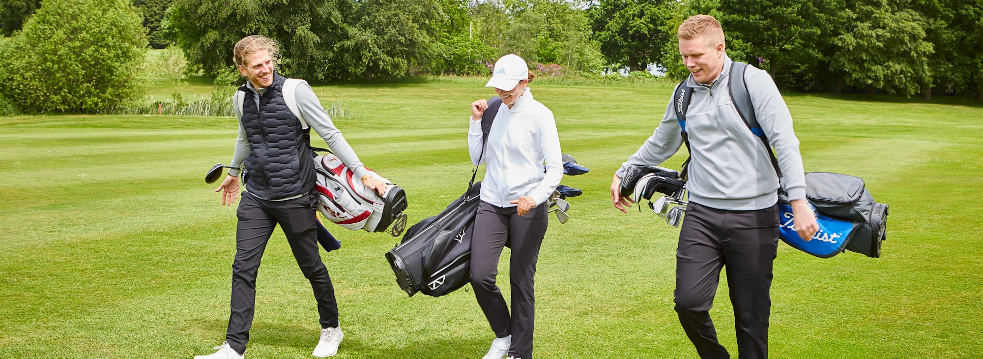 3 players on fairway 3 players on fairway