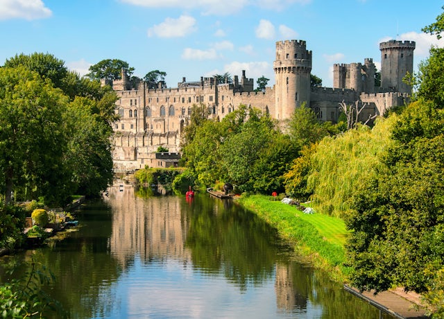 Warwick castle from outside. It is a medieval castle built in 11th century and a major touristic attraction in UK nowadays. Sunny day