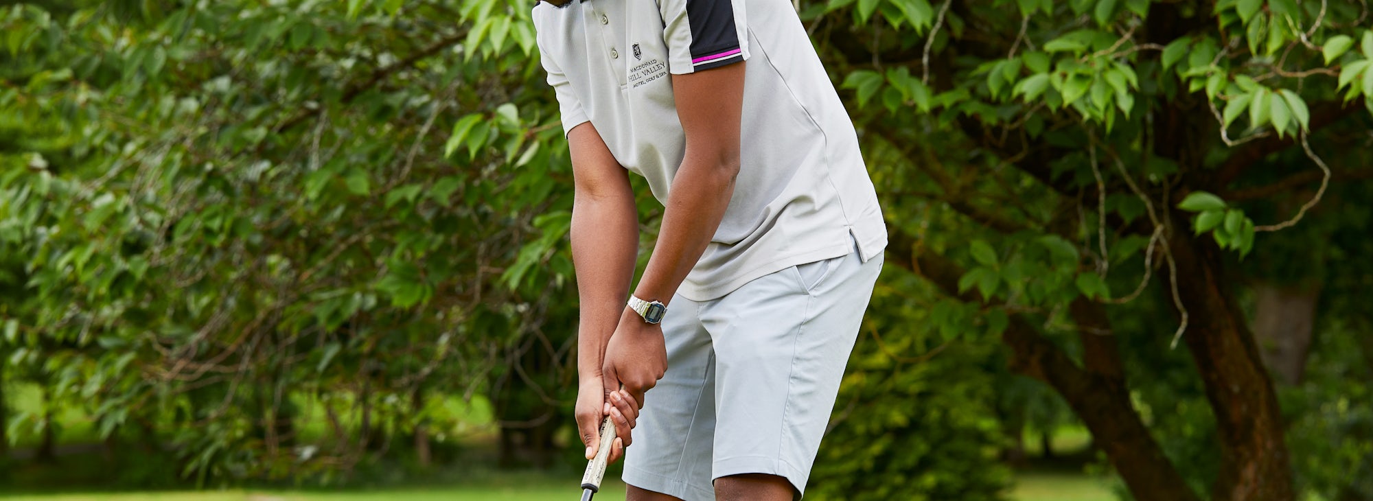 Putting at Hill Valley Golfer practicing putting at Hill Valley