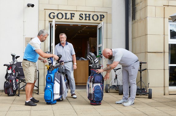 Golfers outside the golf shop at Cardrona