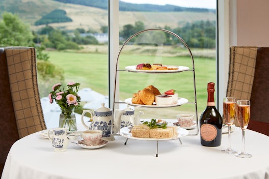 Afternoon tea overlooking the golf course at Cardrona