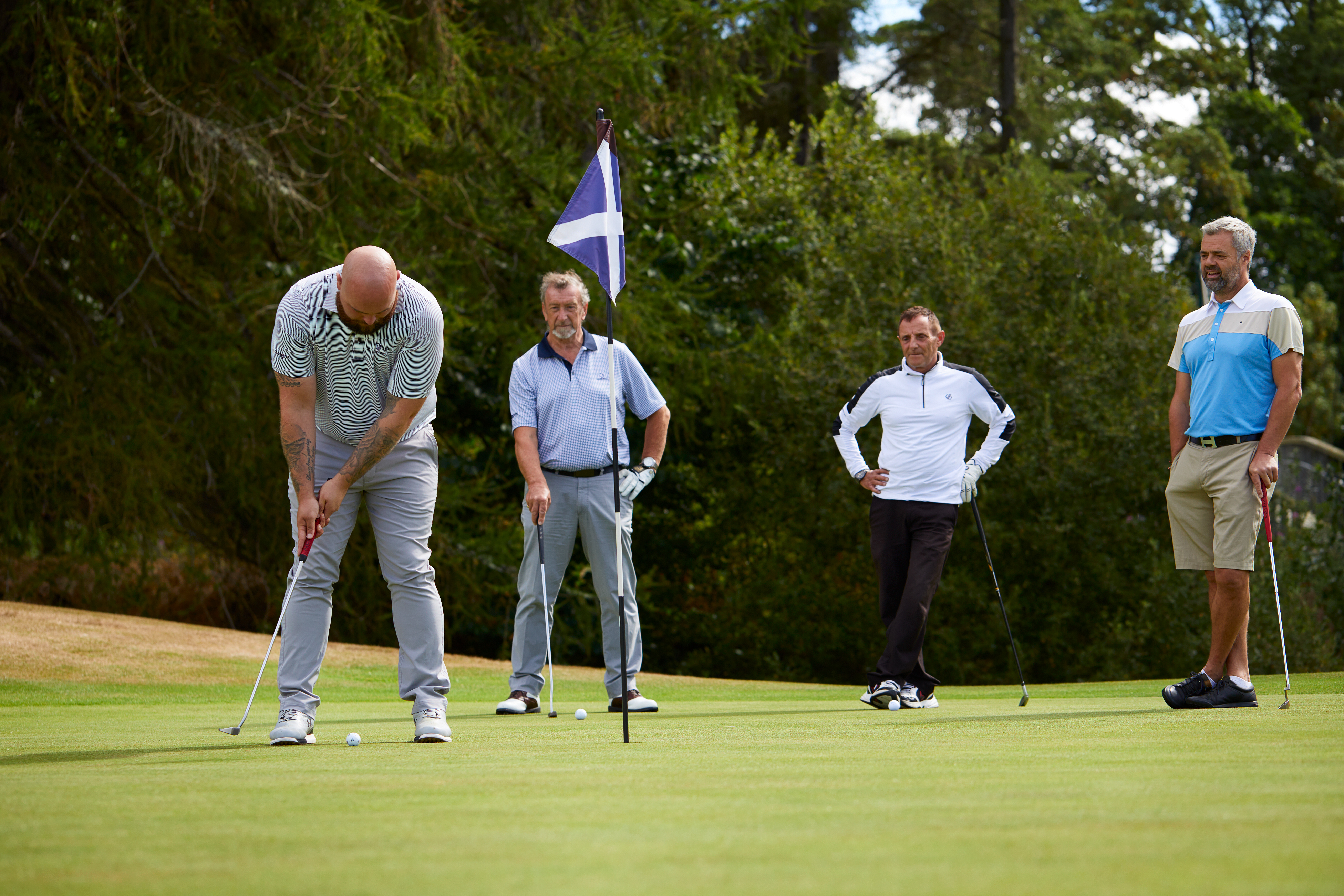 Golfers on the green at Cardrona