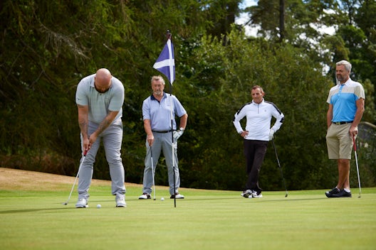 Golfers on the green at Cardrona