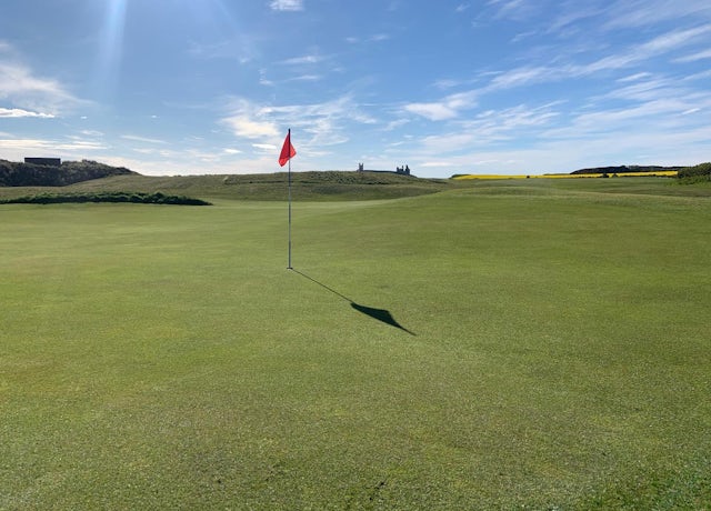 A putting green at Dunstanburgh Links golf course