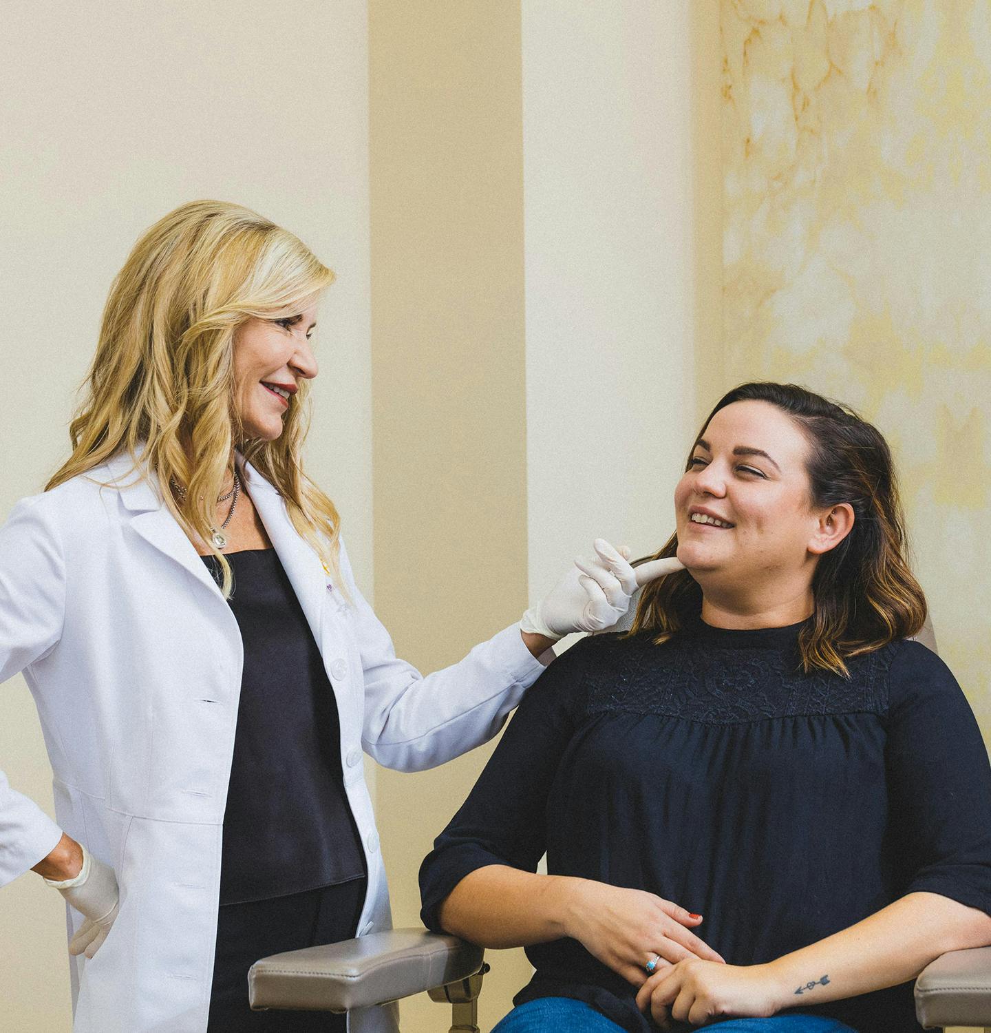 dr hazen touching a woman's chin